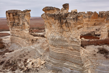 Eroded limestone pillars and stacks in badlands