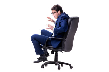 Businessman sitting on office chair isolated on white