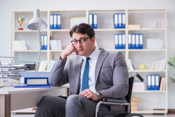 Disabled businessman working in the office