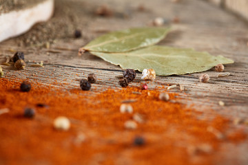 Grind paprica colorful background, close-up, shallow depth of field.