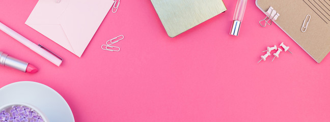 Styled pink feminine workspace flat lay