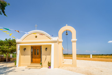 Church, Greece, Kos Island: old cozy little orange stone church with red roof chapel in traditional...