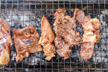 Charcoal-boiled pork neck preparing on the on sieve