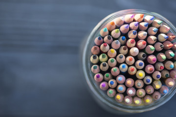 Colored Pencils on a wood background