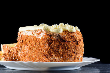 delicious home made biscuit cake on a black background