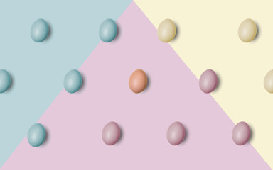 colorized chicken eggs on pastel colors isolated background
