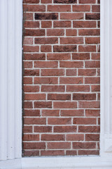 Red brick wall texture with molding