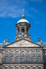 Fototapeta na wymiar The facade and dome of the 17th century Royal Palace of Amsterdam, otherwise known as the Dam Palace, in Amsterdam, Netherlands.