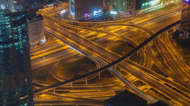 Dubai highway intersection traffic transport node night time-lapse