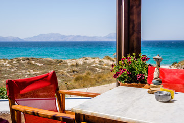 Restaurant, Greece, Kos Island, TamTam Beach: cozy tavern view on the picturesque blue Aegean Greek...