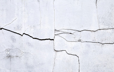 Obraz premium Damage cement wall background, crack texture on white concrete wall, construction concept