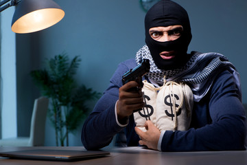 Terrorist burglar with gun asking for money ransom