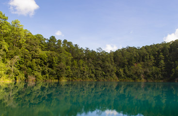 Fototapeta na wymiar Lake with blue water and clear sky