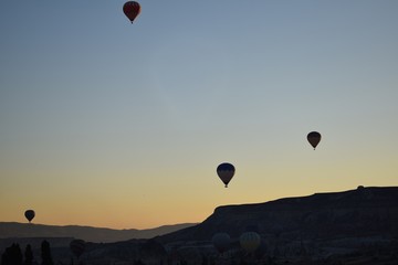 Sunrise in Cappadocia with hot air balloons