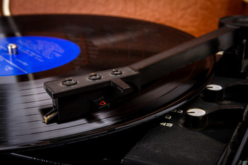 Turntable needle on a vinyl record