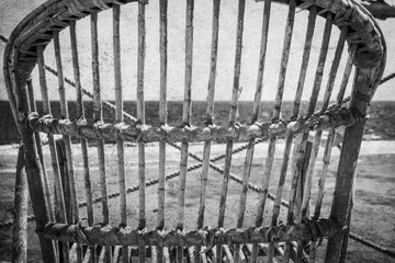 old photo Stylishly beautiful chair on the sea nature landscape background