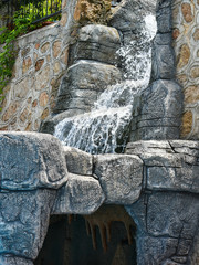 The architectural waterfall is made of stone