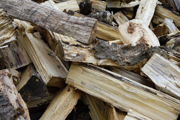 Pile of old birch and aspen firewood, firewood background,
