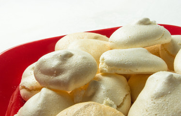 red plate with meringues