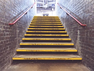 Yellow steps at train station