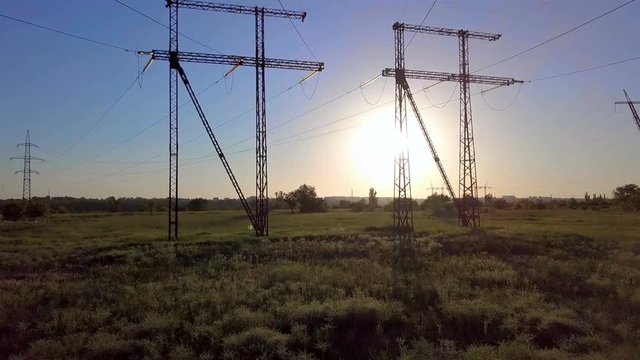 Aerial View of Electricity pylons. Fuel and power generation. 4K