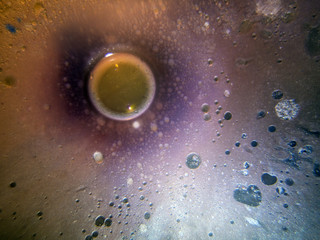 the chemical reaction of the paint with water