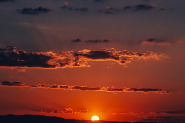 Fototapeta premium Sunset over Ankara Turkey skies. beautiful landscape with a red sunset sky over the field 
