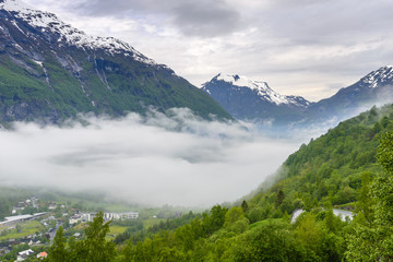 Foggy Geiranger fjord Norway
