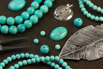 Natural stones, tools, beads, accessories for making jewelry. Needlework..shallow DOF