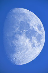 Waxing gibbous moon showing details of lunar surface.