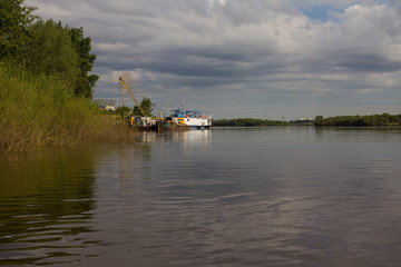 Fototapeta na wymiar boat station on the banks of the Vyatka River