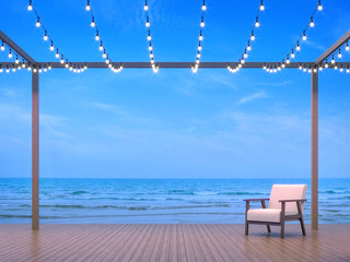 Seaside terrace 3d render,There are wooden floor,Decorate with string light.Overlooks to sea view.