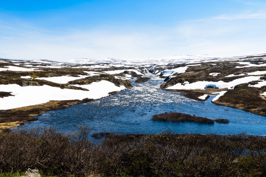 Mountain view over the river Bjoreio in Hardangervidda, Norway. © imfotograf