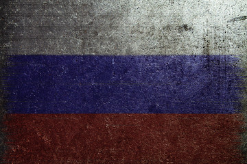 Russian flag on textured metalic wall.
