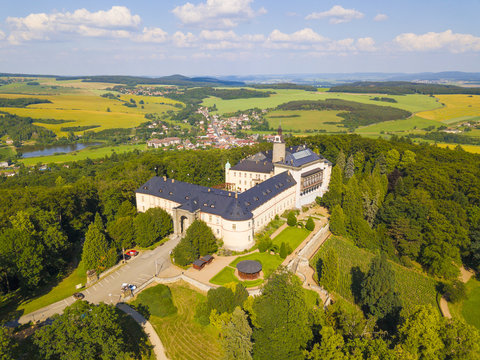 Aerial view of Chateau Zbiroh. Romanesque-Gothic castle was founded at the end of the 12th century. Famous tourist attraction in Czech republic, European union.