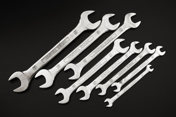 key carob for repair and on a black background