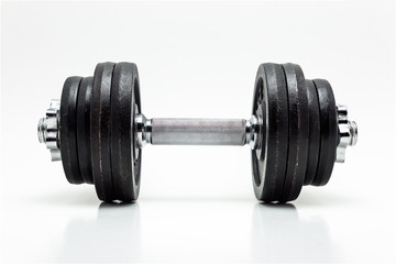 Obraz na płótnie Canvas Black metal dumbbells on white background with clipping path (without a shadow).