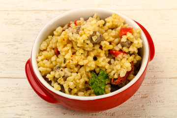 Bulgur with chicken hearts