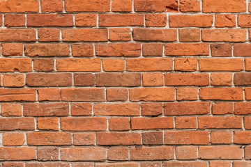 Texture of a old red brick wall background