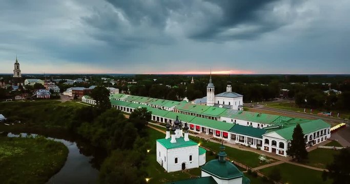 Suzdal, Russia. Panoramic aerial view of churches in Suzdal, Russia at sunrise. Golden tour trip in Russia with beautiful nature and cloudy sky