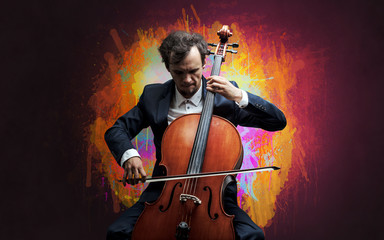 Young classical musician with colorful splotch wallpaper
