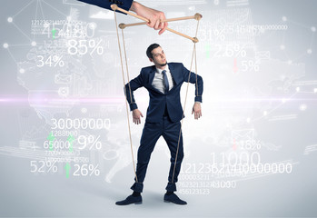 Subordinated puppet man with results numbers and financial concept
