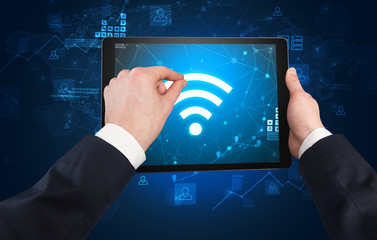 Elegant hand using tablet with online office kit concept
