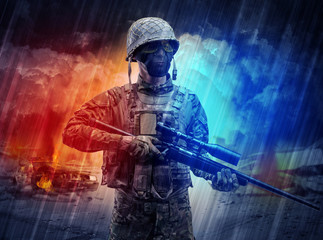 Armed soldier with sniper in the middle of a dust storm
