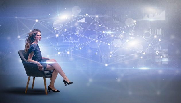 Elegant woman sitting in a sofa with network and connection concept
