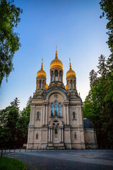 Fototapeta na wymiar The golden domes of the Russian Orthodox Church of St. Elizabeth in Wiesbaden on the Neroberg