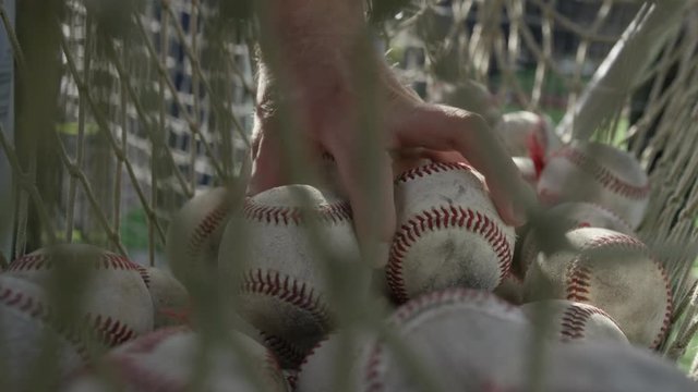 Hand Grabs Baseball