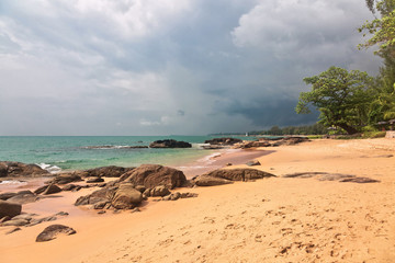 Tropical beach in gloomy weather day