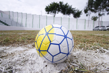 Soccer ball in the center of the lawn