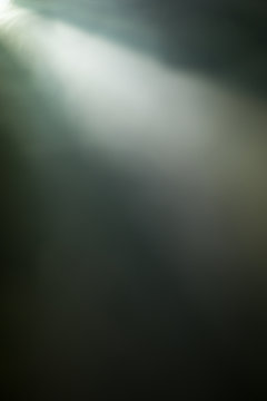 blurred dramatic background , horror spotlights in dark room . fantasy novel screening . smoke abstract nightmare in a dream .